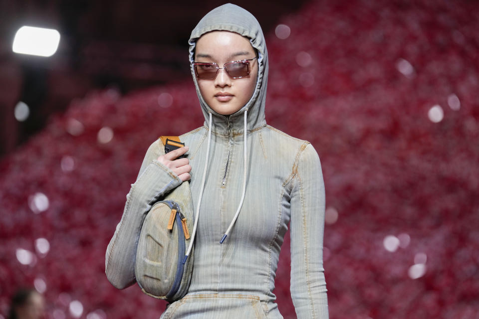 A model wears a creation as part of the Diesel women's Fall-Winter 2023-24 collection presented in Milan, Italy, Wednesday, Feb. 22, 2023. (AP Photo/Luca Bruno)