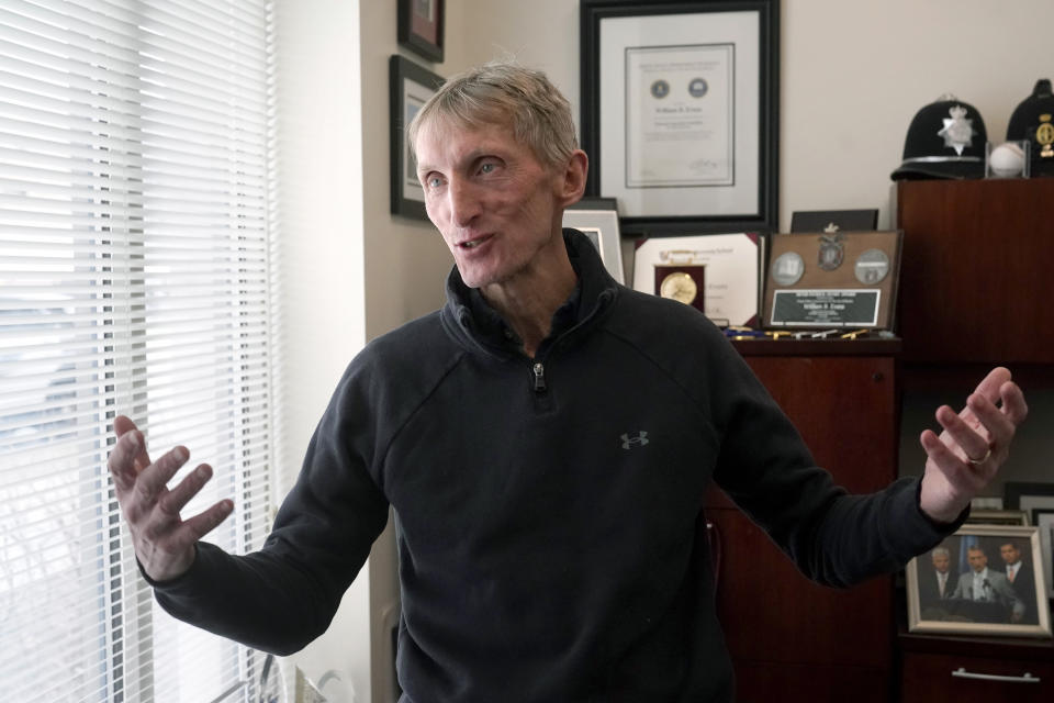 Bill Evans, chief of the Boston College Police Department and former commissioner of the Boston Police Department, speaks with a reporter from The Associated Press, Monday, March 27, 2023, at his office on the school's campus in Boston. In the days following the 2013 marathon bombing, he helped manage a citywide lockdown and manhunt as police identified, searched for, and located the brothers who planted the pair of pressure cooker bombs on Boylston Street.(AP Photo/Steven Senne)