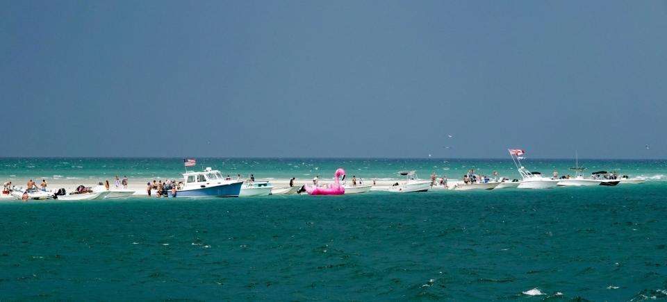 WEST BARNSTABLE -- Colors that rival the Bahamas on the sand bar off the point of Sandy Neck.