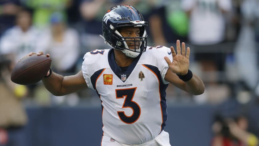 Denver Broncos quarterback Russell Wilson passes against the Seattle Seahawks on Sept. 12, 2022.