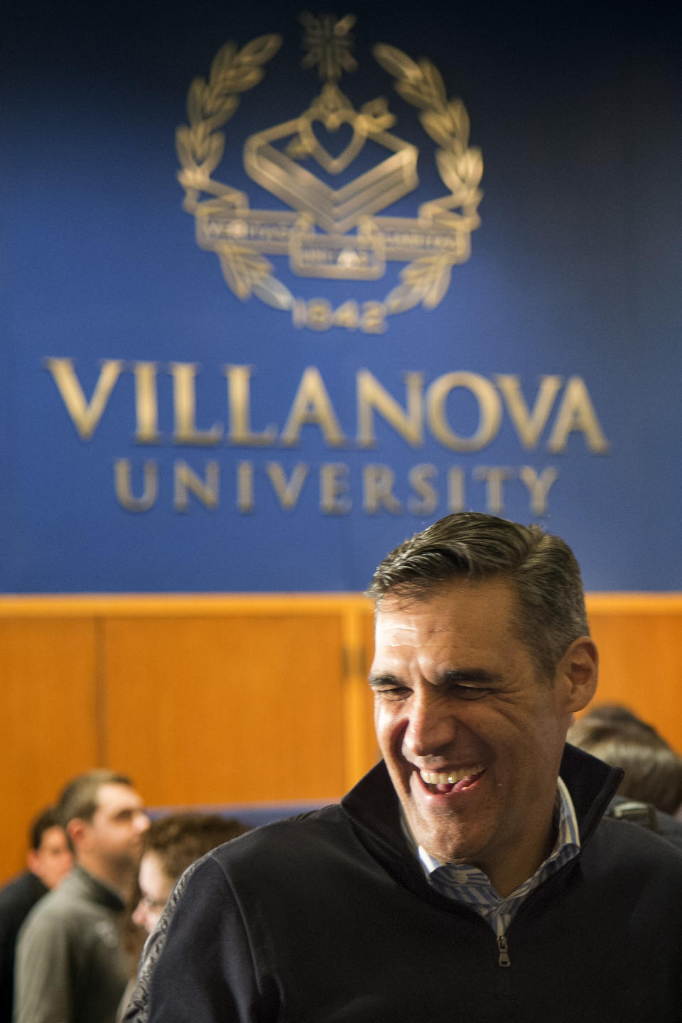 Villanova coach Jay Wright is greeted by fans as he leaves after watching the broadcast of the NCAA men's basketball tournament selection show Sunday, March 12, 2017, in Philadelphia. (Tom Gralish/The Philadelphia Inquirer via AP)