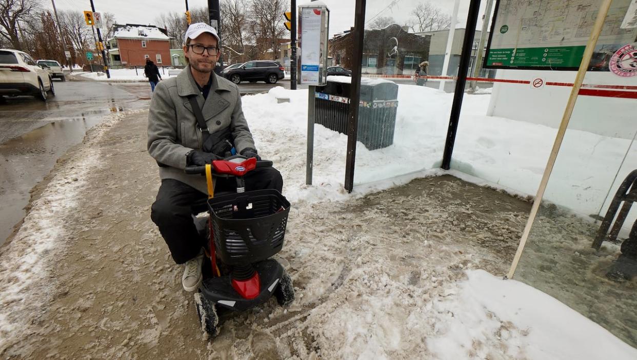 Richard Troy Stewart says he was nearly left stranded when an OC Transpo driver refused to move the bus to a spot where the accessibility ramp could be fully lowered. (Francis Ferland/Radio-Canada - image credit)