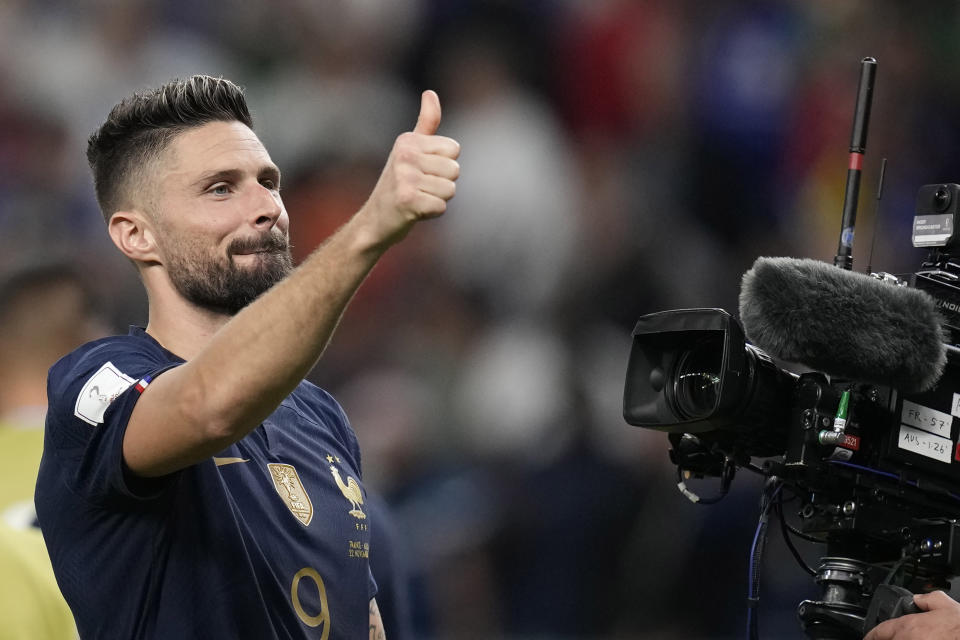 France's Olivier Giroud celebrate the win against Australia after the end of the World Cup group D soccer match between France and Australia, at the Al Janoub Stadium in Al Wakrah, Qatar, Tuesday, Nov. 22, 2022. (AP Photo/Christophe Ena)