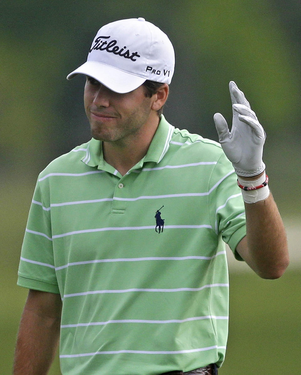 Ben Martin reacts after making eagle on the 11th hole during the second round of the PGA Zurich Classic golf tournament at TPC Louisiana in Avondale, La., Friday, April 25, 2014. Martin set a course record yesterday to take the lead, and started today with an eagle and two birdies on the first four holes. (AP Photo/Gerald Herbert)