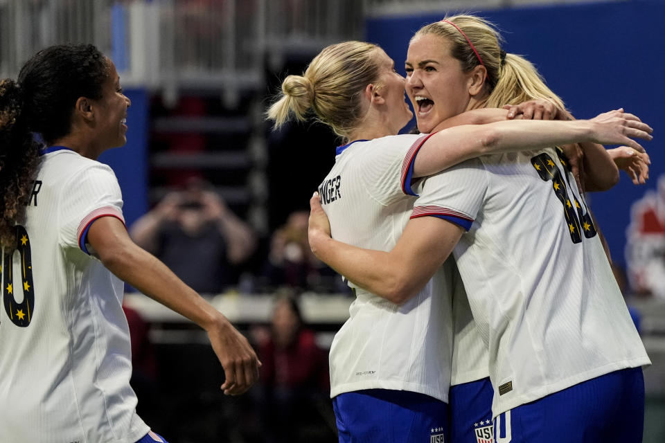 United States' Lindsey Horan, right, celebrates with teammates after scoring goal against Japan during the second half in a SheBelieves Cup women’s soccer game, Saturday, April 6, 2024, in Atlanta. The United States won 2-1. (AP Photo/Mike Stewart)