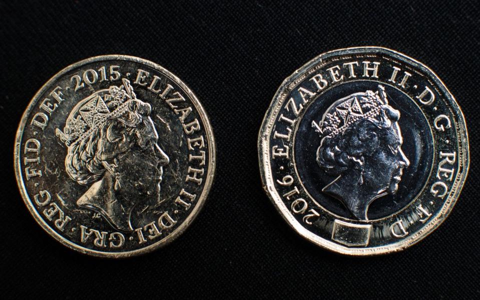 The old and new pound coins - Credit: Jack Taylor/Getty