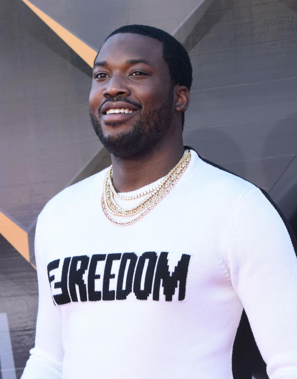 Meek Mill, a rapper and criminal justice reform advocate, takes part in a panel discussion Sunday.