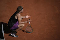 Germany's Alexander Zverev reacts as he plays Stefanos Tsitsipas of Greece during their semifinal match of the French Open tennis tournament at the Roland Garros stadium Friday, June 11, 2021 in Paris. (AP Photo/Christophe Ena)