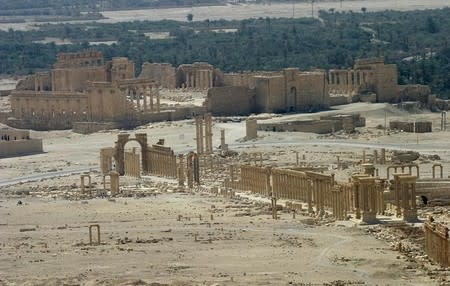 A general view shows the ancient Temple of Bel in the historical city of Palmyra, Syria, June 13, 2009. REUTERS/Gustau Nacarino