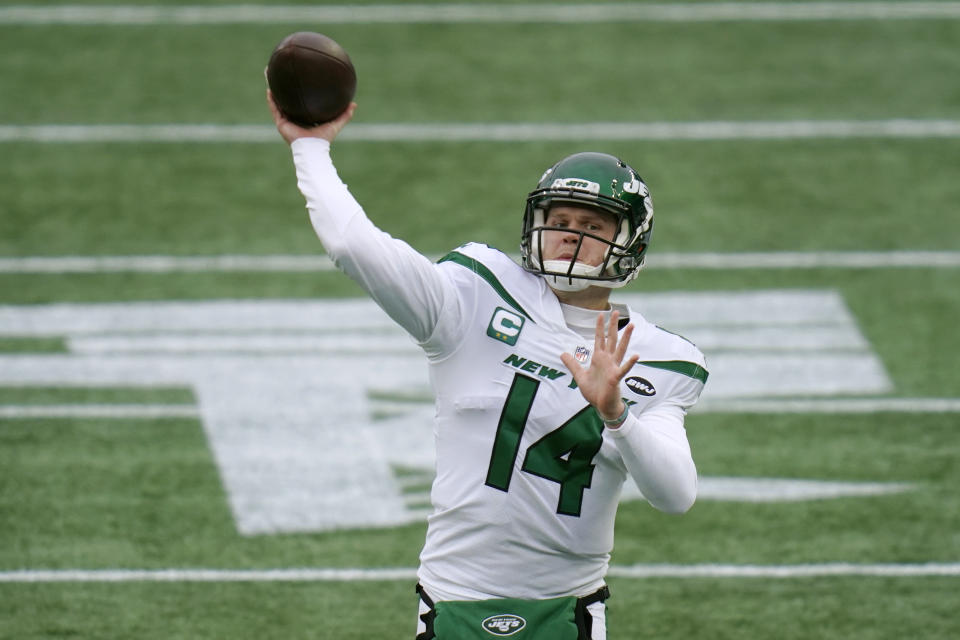 FILE - In this Sunday, Jan. 3, 2021, file photo New York Jets quarterback Sam Darnold warms up before the NFL football game against the New England Patriots in Foxborough, Mass. The New York Jets traded Darnold Monday, April 5, 2021, to the Carolina Panthers, ending a stint that was marked by a few flashes of brilliance, inconsistent play, and unfortunate injuries. (AP Photo/Charles Krupa, File)