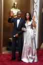 Actor Sidney Potier arrives with his daughter Sydney at the 86th Academy Awards in Hollywood, California March 2, 2014. REUTERS/Lucas Jackson (UNITED STATES TAGS: ENTERTAINMENT) (OSCARS-ARRIVALS)