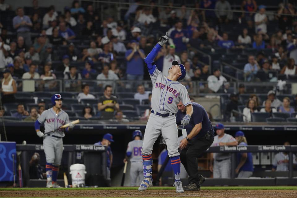 New York Mets' Brandon Nimmo (9) celebrates after hitting a home run during the seventh inning of a baseball game against the New York Yankees Monday, Aug. 13, 2018, in New York. (AP Photo/Frank Franklin II)