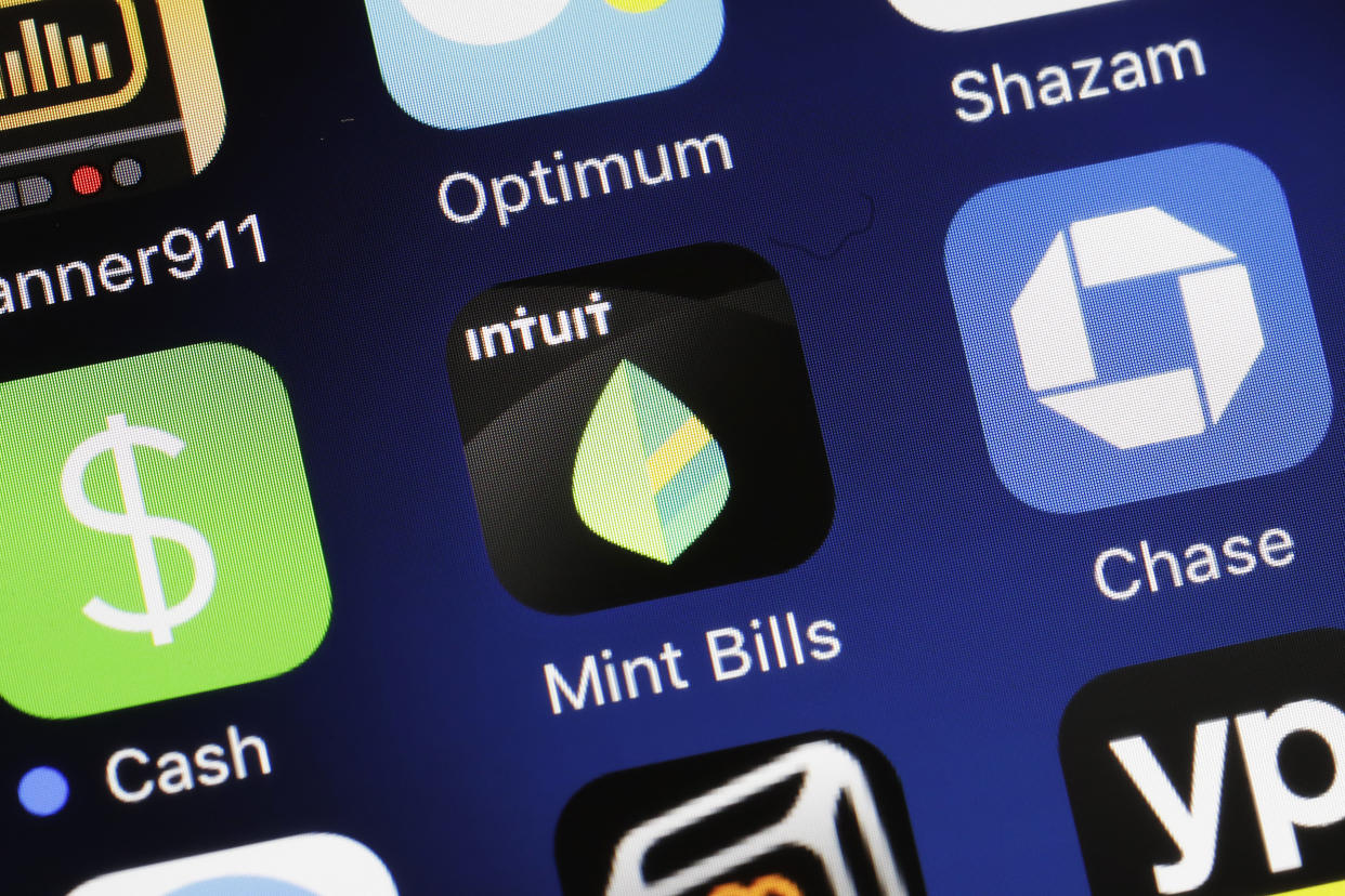 Corporations by banks such as Chase and third-parties like Intuit can lead to innovative solutions like Mint. But if they don’t cooperate, consumers lose. (AP Photo/Mark Lennihan)