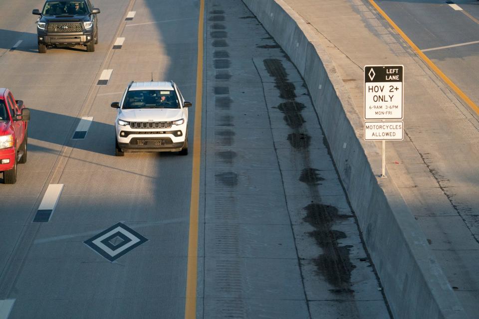 Early morning commuters utilize the new HOV lanes on 75 southbound through Oakland County between 6-9 AM on Wednesday, Dec. 20, 2023.