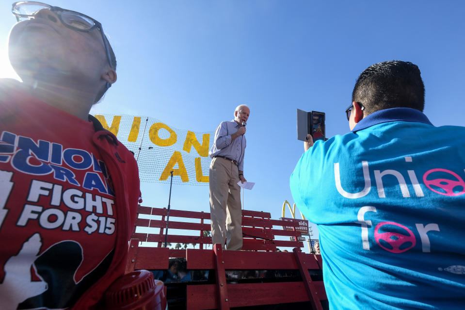 FILE - In this Dec. 19, 2019, file photo Democratic presidential candidate former Vice President Joe Biden, speaks at a rally in support of McDonald's cooks and cashiers who are demanding higher wages and union rights, outside a McDonald's restaurant in Los Angeles. The Biden administration is giving a bit of simple advice to businesses that are unable to find workers: Offer them more money. Boosting wages gets at the central promise of the Biden presidency to improve the lives of everyday. (AP Photo/Ringo H.W. Chiu, File)