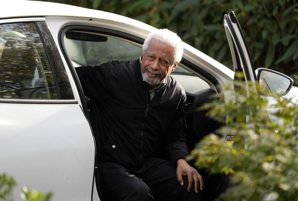 Tanzanian writer Abdulrazak Gurnah arrives back at his home in Canterbury, England, Thursday, Oct. 7, 2021. Gurnah was awarded the Nobel Prize for Literature earlier on Thursday. The Swedish Academy said the award was in recognition of his "uncompromising and compassionate penetration of the effects of colonialism." (AP Photo/Frank Augstein)