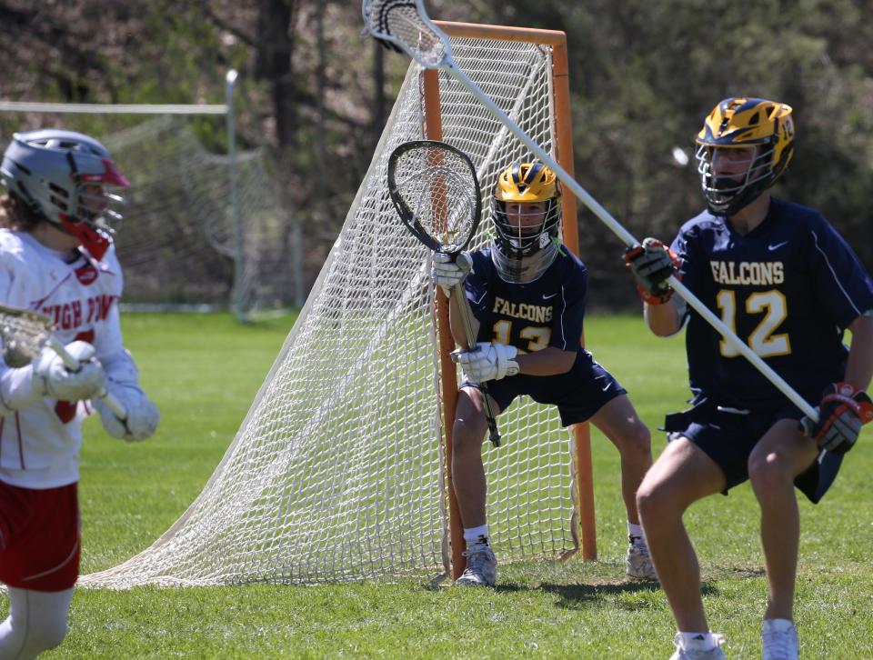 Jefferson goalkeeper Jamison Reid of Jefferson gets help from Alex Johns as Jefferson defeated High Point 15-2 in Boys Lacrosse played at Walkill Valley NJ on April 20, 2022.