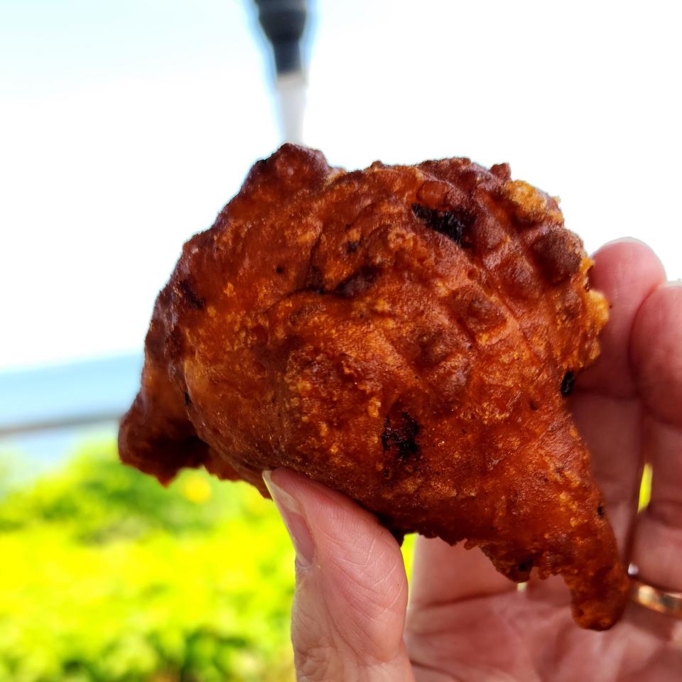 If you want to know where the clams are in clam cakes, look at the dark marks on the crusty exterior. Those are clams fried hot by the oil.