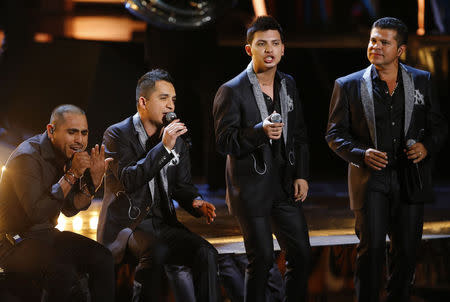 La Arrolladora Banda El Limon de Rene Camacho, featuring Espinoza Paz, perform a medley of songs. REUTERS/Mike Blake