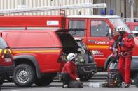 French firefighters prepare to take-off in Digne-les-Bains for the crash site of an Airbus A320, in the French Alps, March 24, 2015. REUTERS/Jean-Paul Pelissier