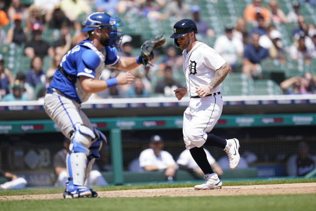Detroit Tigers' Tucker Barnhart scores as Kansas City Royals catcher Cam Gallagher (36) waits for the throw in the seventh inning of a baseball game in Detroit, Sunday, July 3, 2022. (AP Photo/Paul Sancya)
