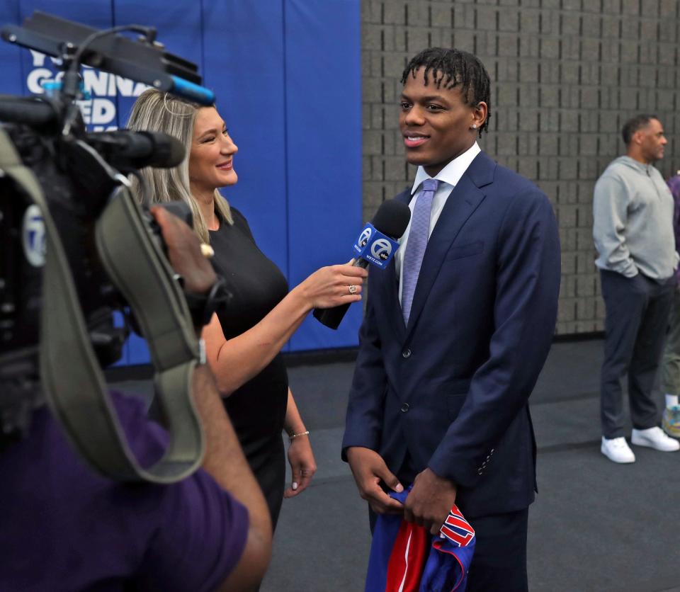 Detroit Pistons draft pick Marcus Sasser does an interview after an introductory news conference at the Henry Ford Detroit Pistons Performance Center, Friday, June 23, 2023.