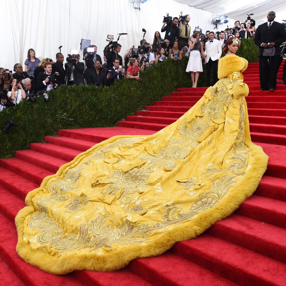 Rihanna’s 16-foot train, Cher’s naked dress, and Katy Perry’s angel wings included.