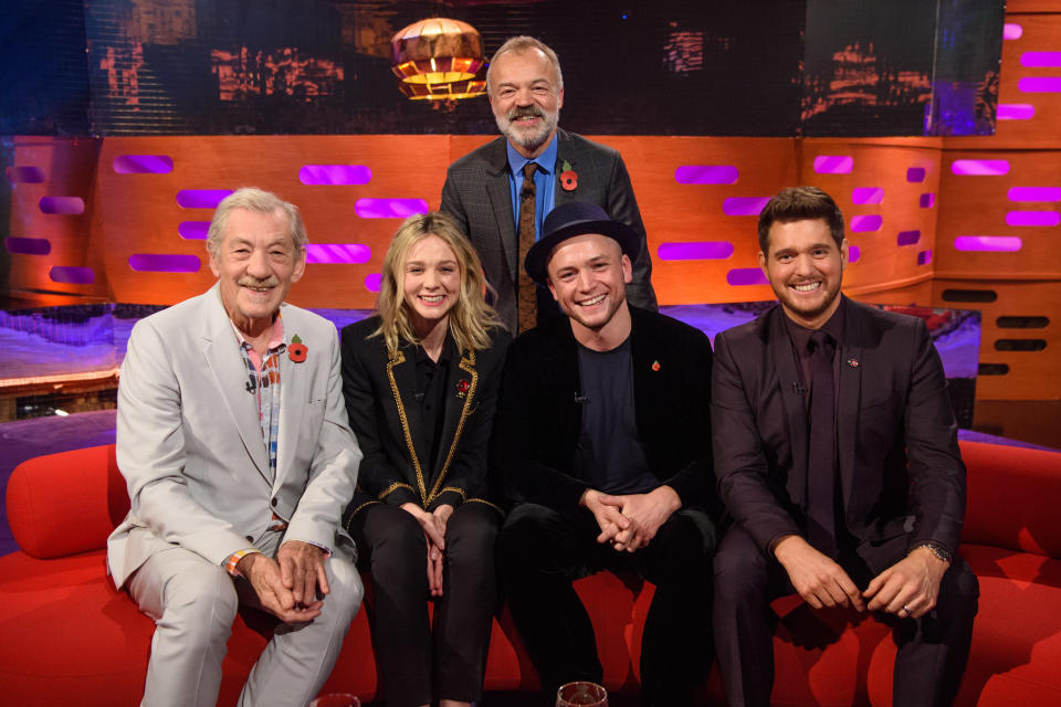 Presenter Graham Norton stands behind (left to right) Sir Ian McKellen, Carey Mulligan, Taron Egerton and Michael Buble, during the filming of the Graham Norton Show (Matt Crossick/PA)