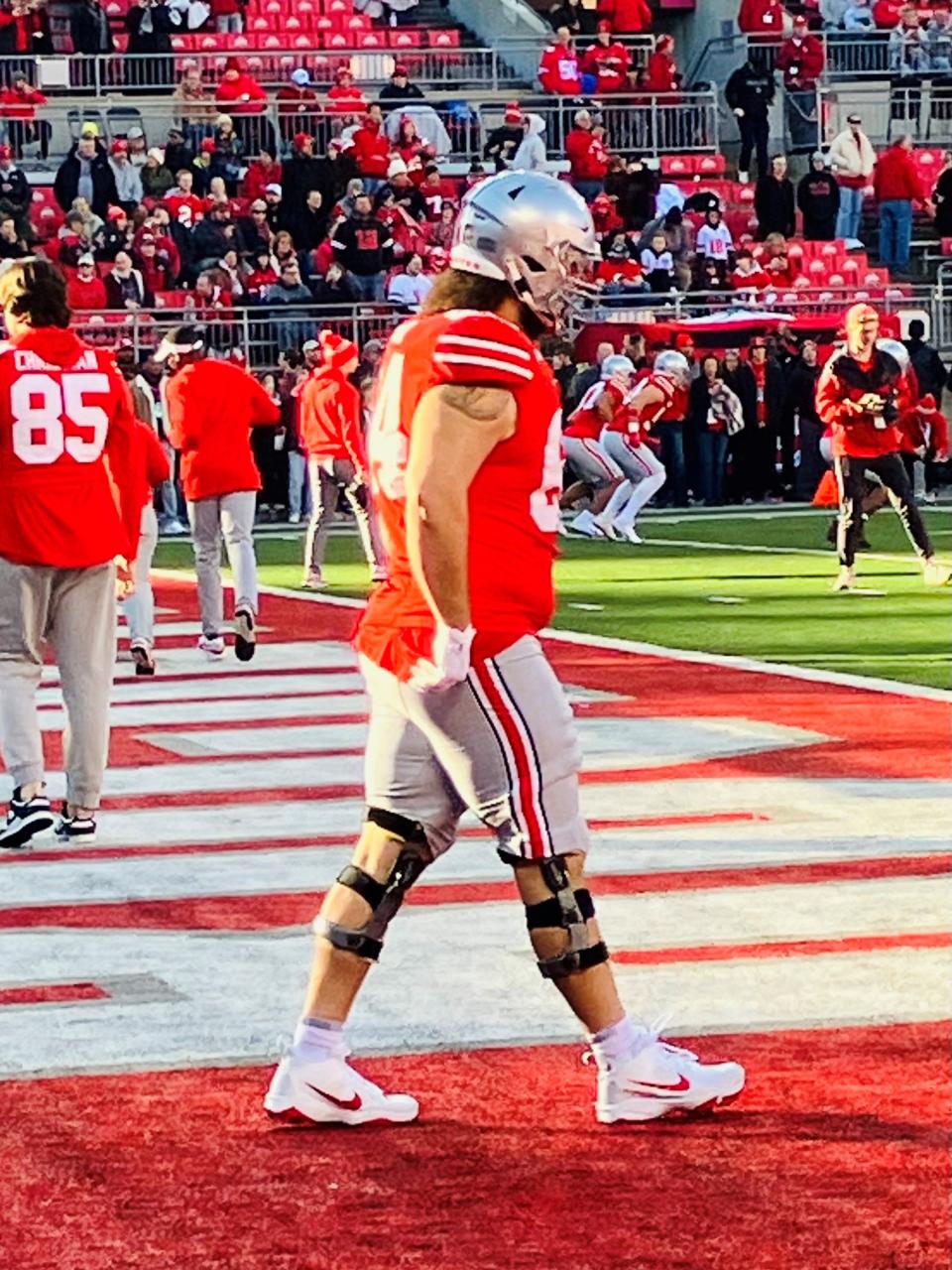 Former Lancaster standout Quinton Burke warms up at Ohio Stadium for the final time on Saturday, Nov. 18. He, along with 21 other players were honored before the game for Ohio State's Senior Day.