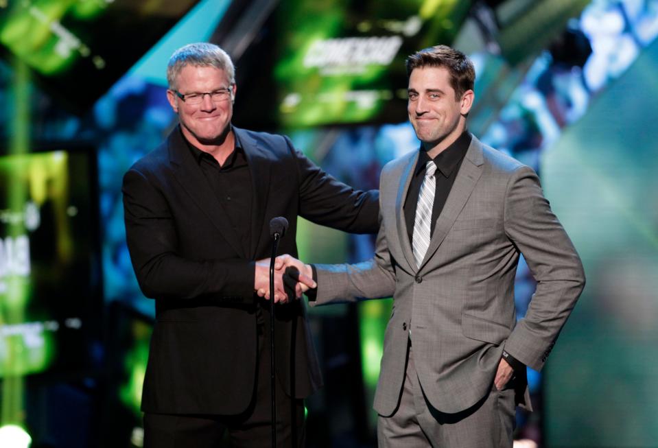 Brett Favre, left, and Aaron Rodgers present at the 2nd Annual NFL Honors on Saturday, Feb.  2, 2013 in New Orleans.