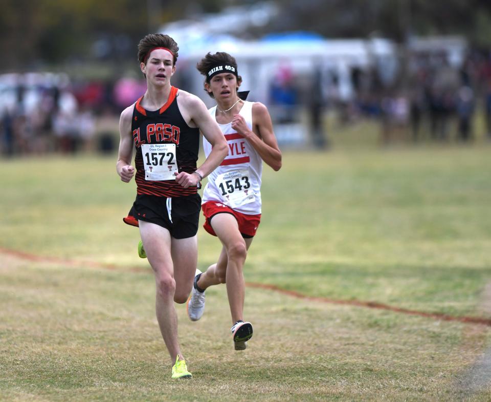 El Paso High’s Ulysses O’Rourke, left, and Argyle’s Lucca Sanabria compete in the UIL Region I-5A boys cross country meet, Monday, Oct. 23, 2023, at Mae Simmons Park.