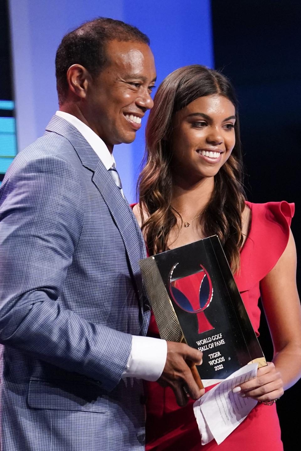 Tiger Woods is all smiles with his daughter Sam during last year's World Golf Hall of Fame Induction Ceremony at the PGA Tour Global Home in Ponte Vedra Beach.