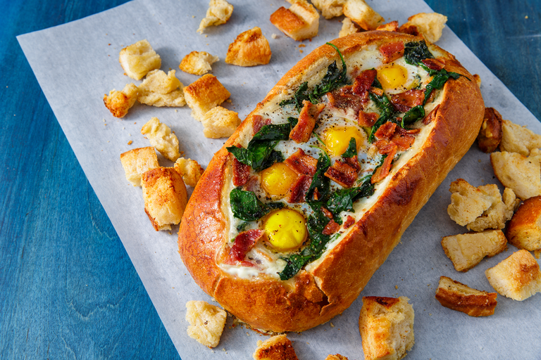 <p>This bread is stuffed with a full <a href="https://www.delish.com/uk/cooking/recipes/g30688413/breakfast-recipes/" rel="nofollow noopener" target="_blank" data-ylk="slk:breakfast;elm:context_link;itc:0;sec:content-canvas" class="link ">breakfast</a> and it's absolutely everything you want. The extra bread is perfect for dipping in the eggs and such a fun way to share breakfast. </p><p>Get the <a href="https://www.delish.com/uk/cooking/recipes/a34379266/cheesy-breakfast-boat-recipe/" rel="nofollow noopener" target="_blank" data-ylk="slk:Cheesy Breakfast Boat;elm:context_link;itc:0;sec:content-canvas" class="link ">Cheesy Breakfast Boat</a> recipe.</p>