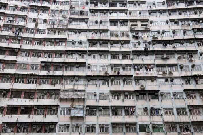 Residential units clustered tightly together in an apartment complex in the Quarry Bay area of Hong Kong.<span class="copyright">Alex Ogle/AFP via Getty Images</span>