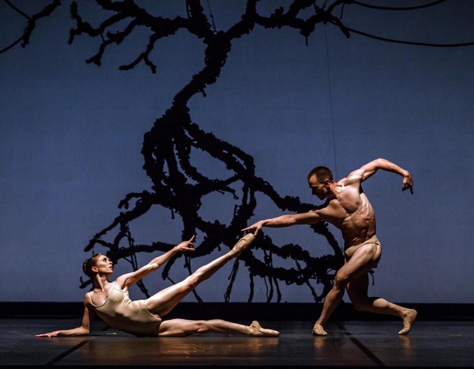 This undated photo provided by Ballet Austin shows Ashley Lynn Gilfix, left, and Frank Schotte performing Light/The Holocaust Project, a dance performance about intolerance and genocide. Ballet Austin Artistic Director Stephen Mills created the dance after interviewing survivors of the Nazi Holocaust, which killed 6 million Jews by the end of World War II. Ballets that wish to host or perform Light/The Holocaust Project must agree to a public anti-bigotry campaign in their communities.(AP Photo/Ballet Austin, Tony Spielberg)