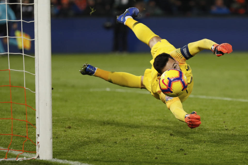 France's goalkeeper Hugo Lloris saves on a shot during the international friendly soccer match between The Netherlands and France at De Kuip stadium in Rotterdam, Netherlands, Friday, Nov. 16, 2018. (AP Photo/Peter Dejong)