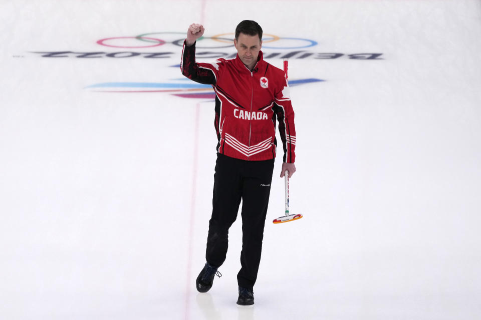 Canada's Brad Gushue celebrates after winning the men's curling bronze medal match between Canada and the United States at the Beijing Winter Olympics Friday, Feb. 18, 2022, in Beijing. (AP Photo/Nariman El-Mofty)