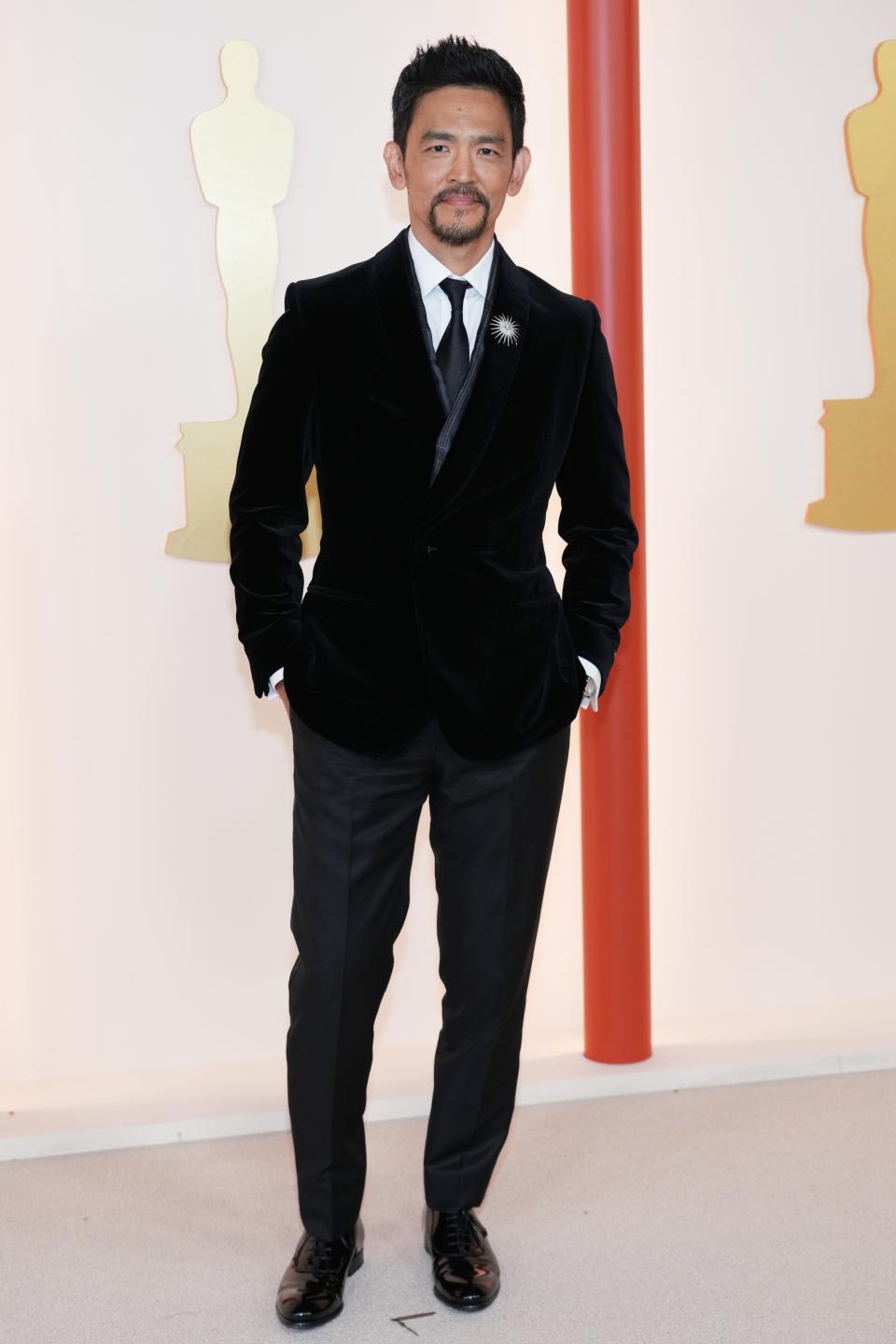 John Cho attends the 2023 Academy Awards.