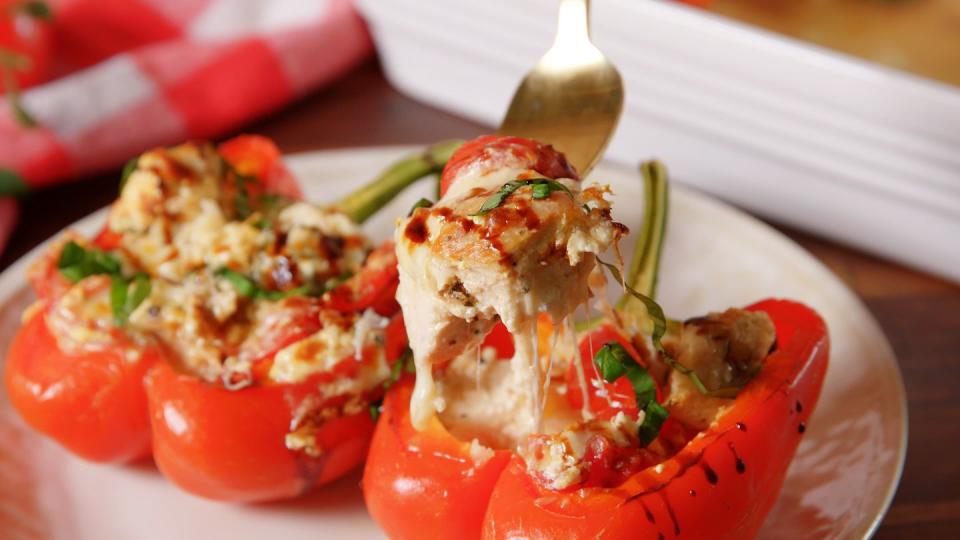 <p>Just cut this recipe in half and you'll have two perfect peppers for the holiday dinner that dreams are made of.</p><p>Get the recipe from <a href="https://www.delish.com/cooking/recipe-ideas/recipes/a52618/caprese-chicken-stuffed-peppers-recipe/" rel="nofollow noopener" target="_blank" data-ylk="slk:Delish;elm:context_link;itc:0;sec:content-canvas" class="link ">Delish</a>.</p>