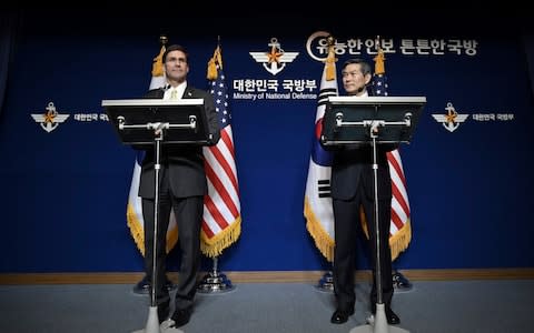 US Defense Secretary Mark Esper, left, and South Korean Defense Minister Jeong Kyeong-doo, hold a joint press conference - Credit: Jung Yeon-je/Pool Photo via AP