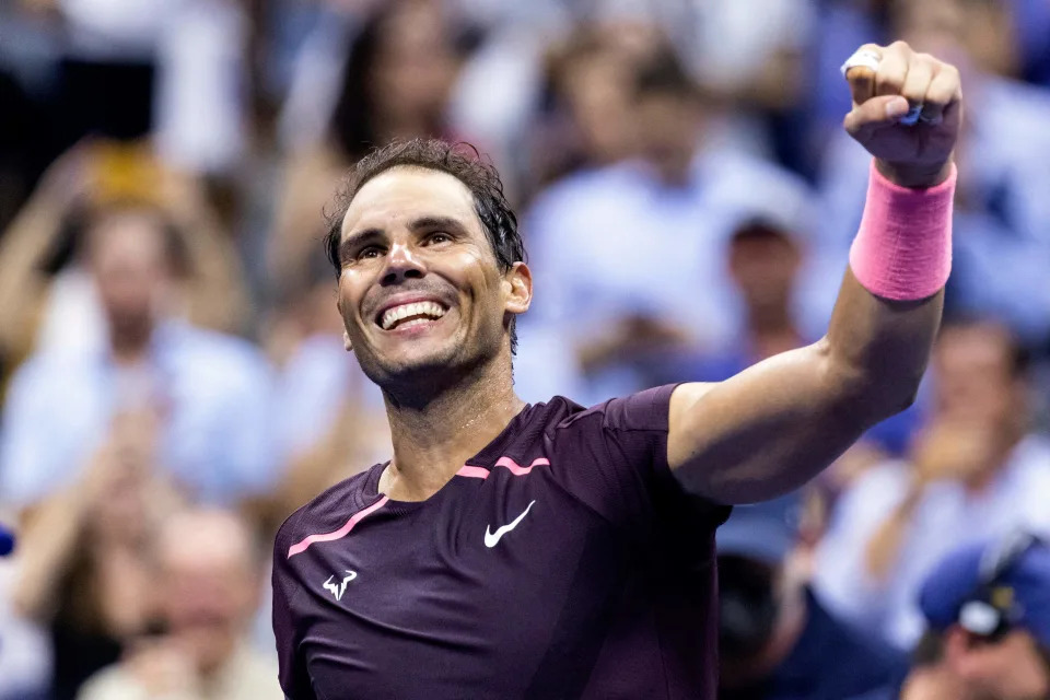 Rafael Nadal (pictured) fist-pumps and smiles as he celebrates his US Open first round victory over Rinky Hijikata.