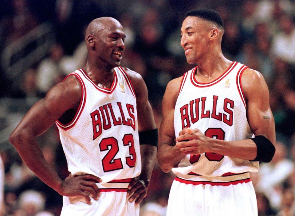 FILE PHOTO 22MAY97 - The Chicago Bulls will begin their defense of their NBA title without Scottie Pippen, shown in a May 22, 1997, file photo with teammate Michael Jordan (L), after the All-Star forward underwent surgery on his ailing left foot that will keep him out of action for two to three months, the team said on October 7. Bulls&#39; general manager Jerry Krause said that Pippen flew to New York on October 6 for the surgery, which was performed on the second toe on Pippen&#39;s left foot.

NBA PIPPEN