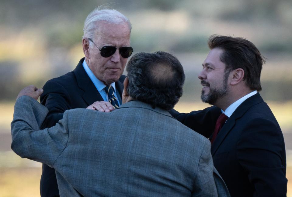 President Joe Biden greets Reps. Raúl Grijalva (center) and Ruben Gallego (right) on Aug. 7, 2023, at Grand Canyon National Airport, in Tusayan.