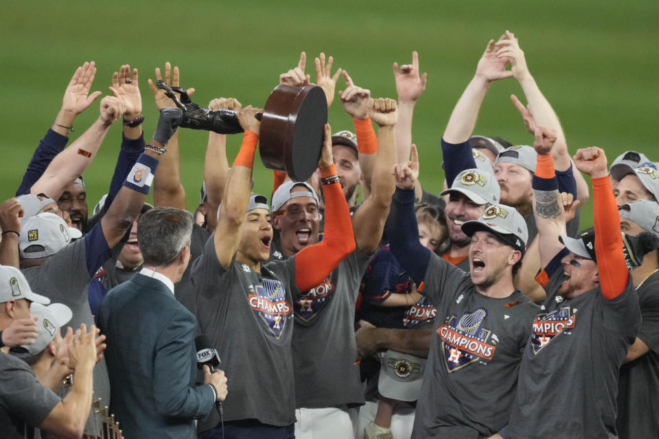 Houston Astros shortstop Jeremy Pena holds the MVP tropy as the Houston Astros celebrate their 4-1 World Series win against the Philadelphia Phillies in Game 6 on Saturday, Nov. 5, 2022, in Houston. (AP Photo/Eric Smith)