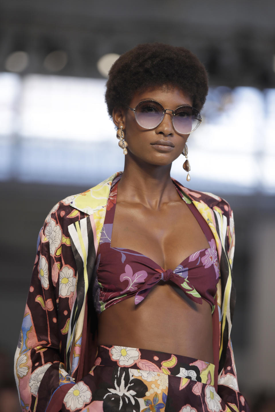 A model wears a creation as part of the Etro women's 2019 Spring-Summer collection, unveiled during the Fashion Week in Milan, Italy, Friday, Sept. 21, 2018. (AP Photo/Luca Bruno)