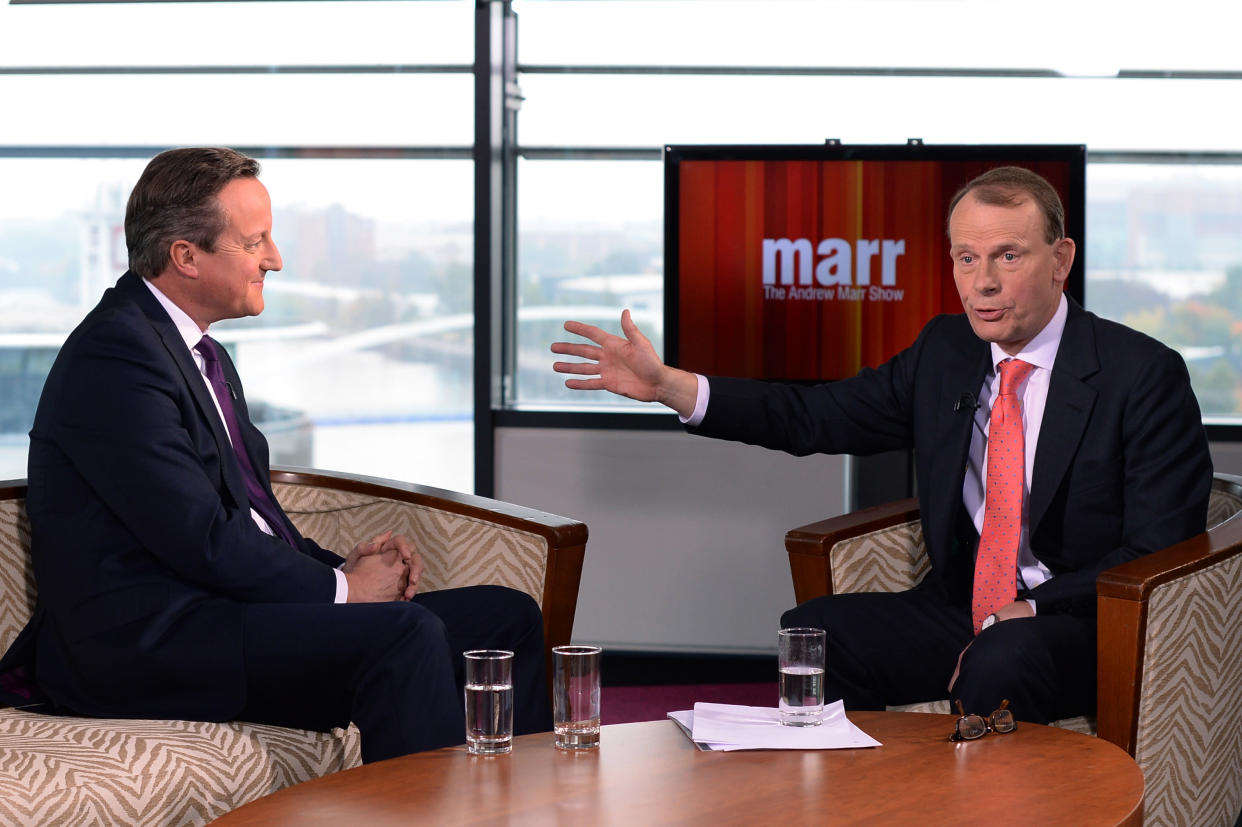 Prime Minister David Cameron (L) appears on the Andrew Marr show in Manchester, Northern Britain, October 4, 2015. REUTERS/Stefan Rousseau/Pool