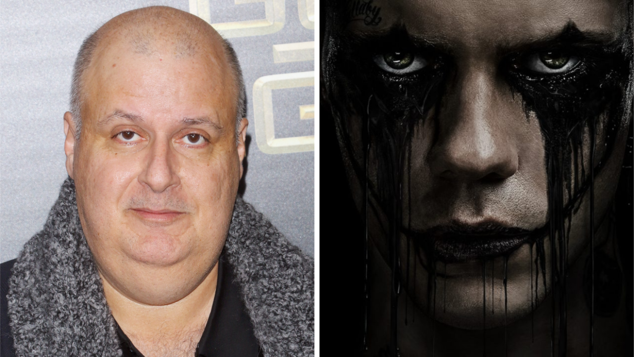  Alex Proyas next to the poster for The Crow 2024. 