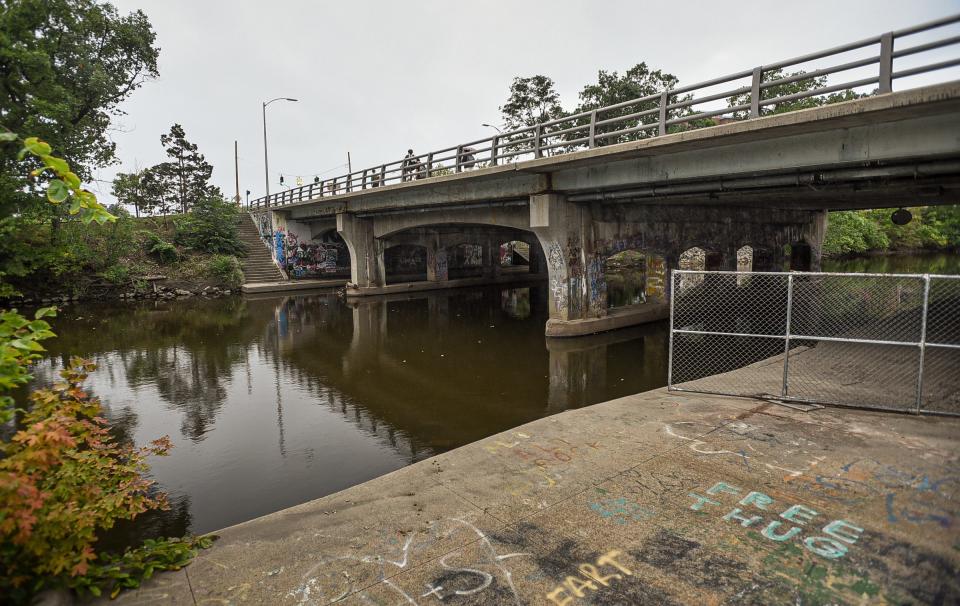 The Farm Lane bridge over the Red Cedar River on the campus of Michigan State University, seen Wednesday, Sept. 6, 2023. The river trail beneath the bridge is blocked off to pedestrians.