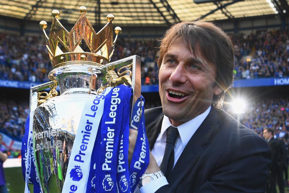 Chelsea manager Antonio Conte celebrates with the Premier League trophy