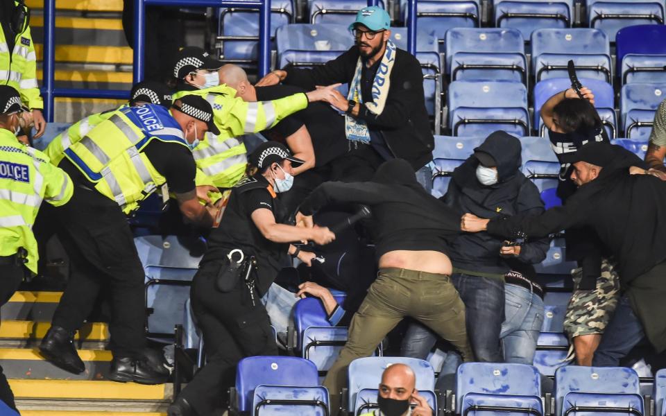 Napoli ultras fight with Leicester City fans and police as violence mars Europa League clash - EPA